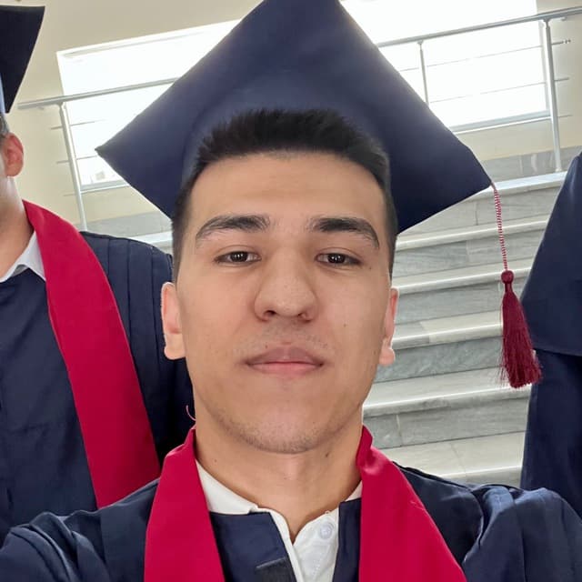Kamron Fozilov at TUIT graduation ceremony.